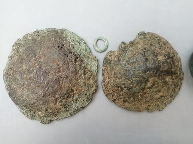 Copper cakes and Bronze Age ring