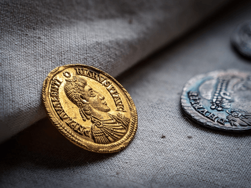 The Patching Hoard was discovered by two metal detectorists, Terry Bromley & Terry Silver, in a field near Patching village in 1997.  A total of 23 gold solidi, 27 silver siliquae, 2 gold rings of exceptional purity and a Roman-pound weight of hack silver were recovered from the site. The hoard is one of the last ‘Roman’ coin hoards to be found in Britain, much of it being acquired on the Continent and brought into Sussex at a time when the Western Roman Empire was crumbling and new polities were emerging on either side of the Channel.